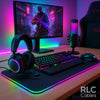Gaming setup with 2025 accessories: SteelSeries Arctis Nova 7, Razer BlackWidow V4 Pro, Govee RGBIC LED lights, ASUS TUF Gaming VG27AQ monitor, and RGB lighting.